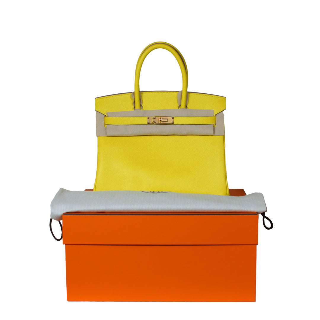 The handbag comes with the original dust bag and box.