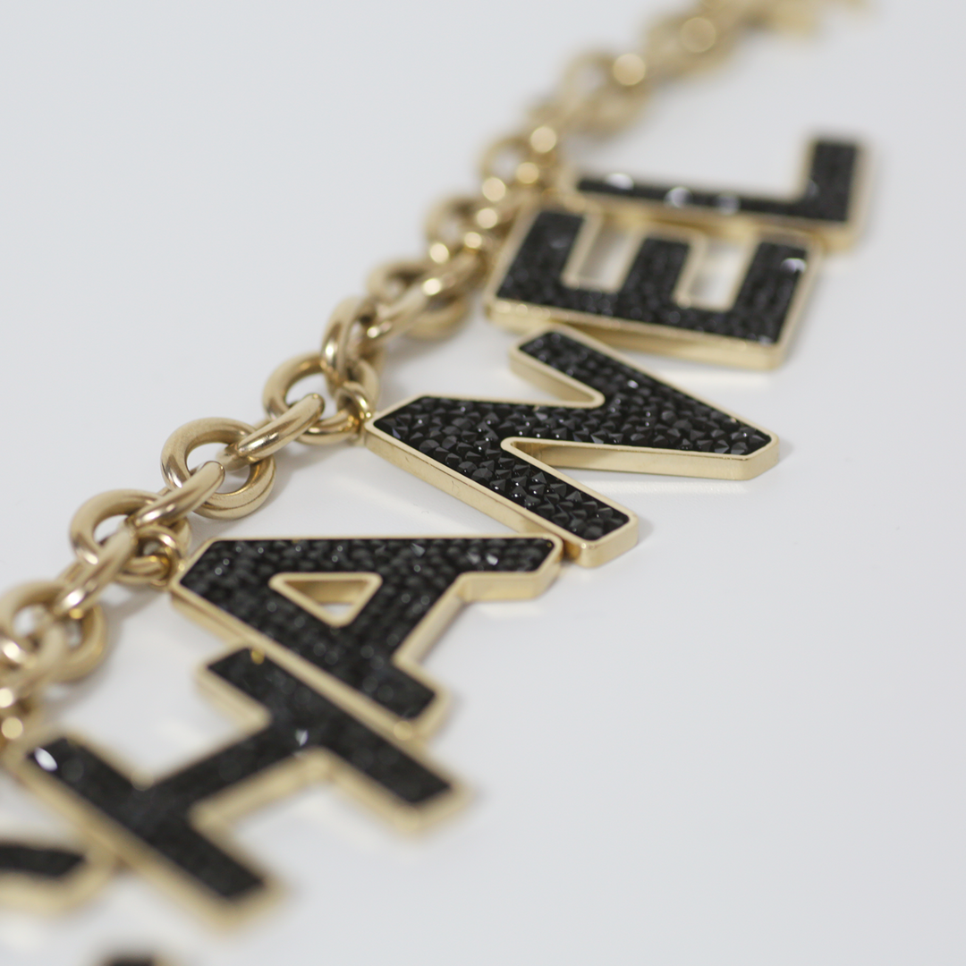 Chanel Black Crystal-Encrusted Letters Gold Chain Charm Bracelet