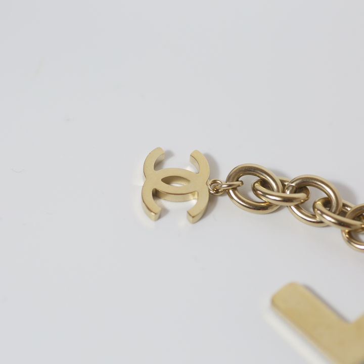 Chanel Black Crystal-Encrusted Letters Gold Chain Charm Bracelet