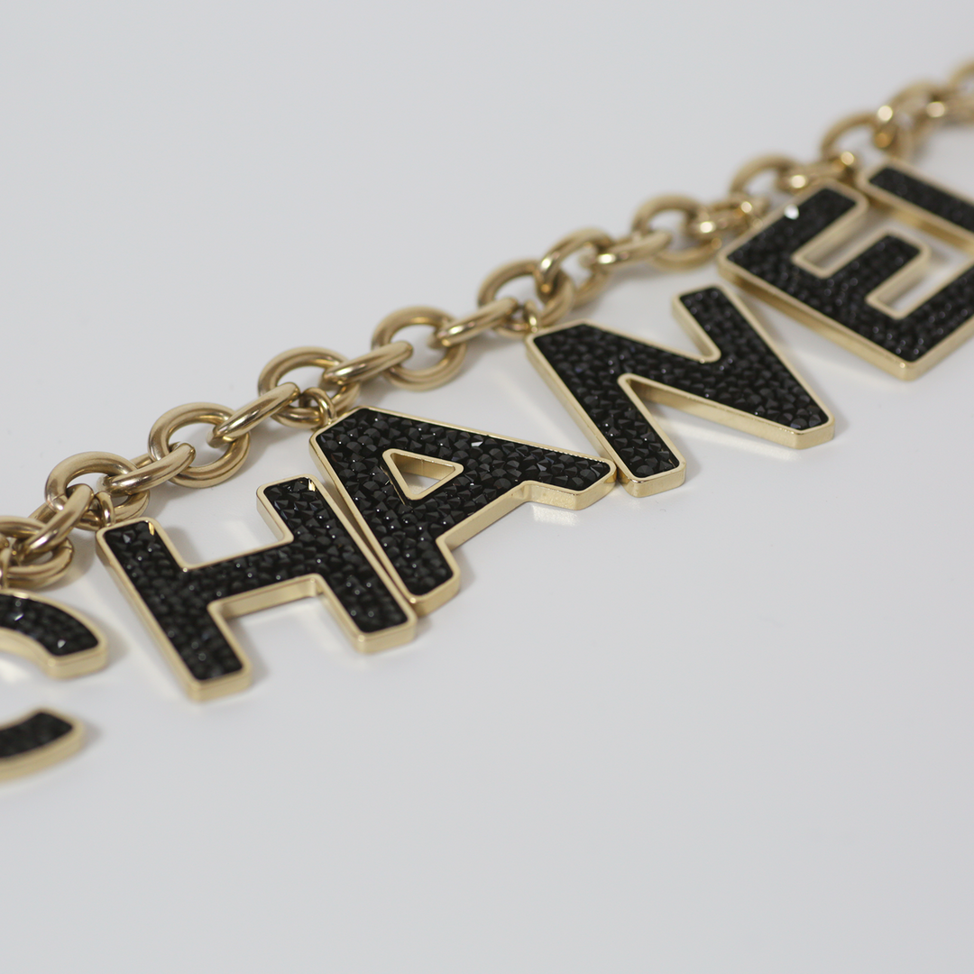 Chanel Black Crystal-Encrusted Letters Gold Chain Charm Bracelet