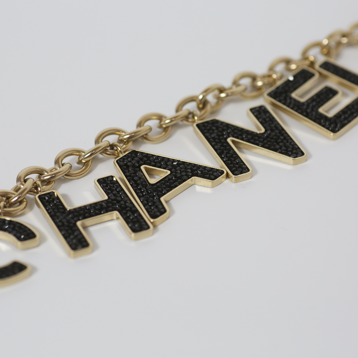 Chanel Black Crystal-Encrusted Letters Gold Chain Charm Bracelet