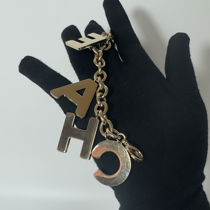 Chanel Black Crystal-Encrusted Letters Gold Chain Charm Bracelet