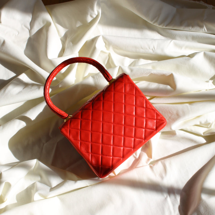 The back of the vintage Chanel Kelly bag with the iconic diamond quilting.