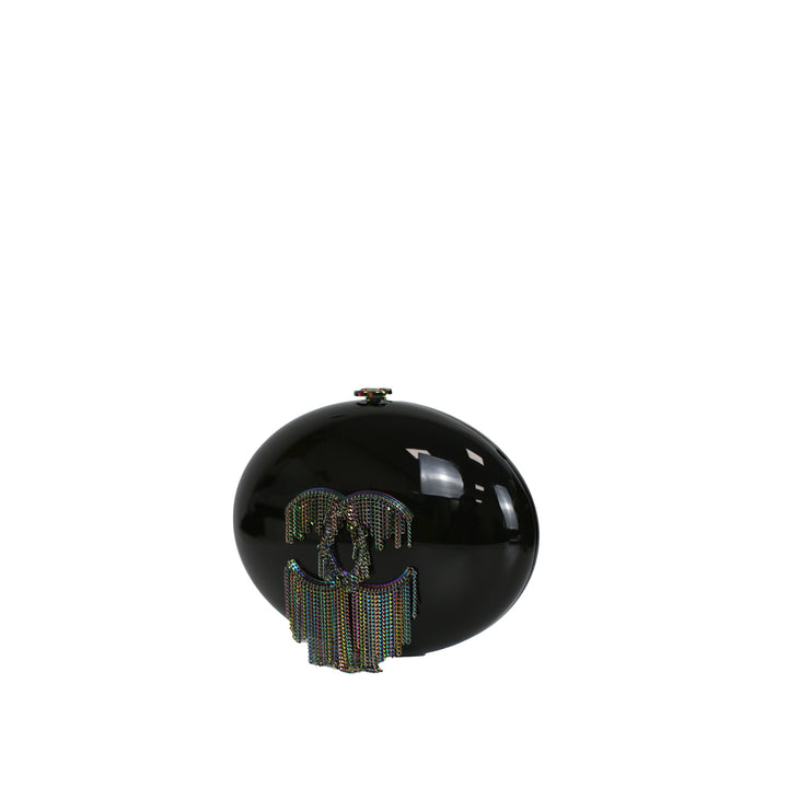 This minaudiere features a shiny black plexiglass finish.