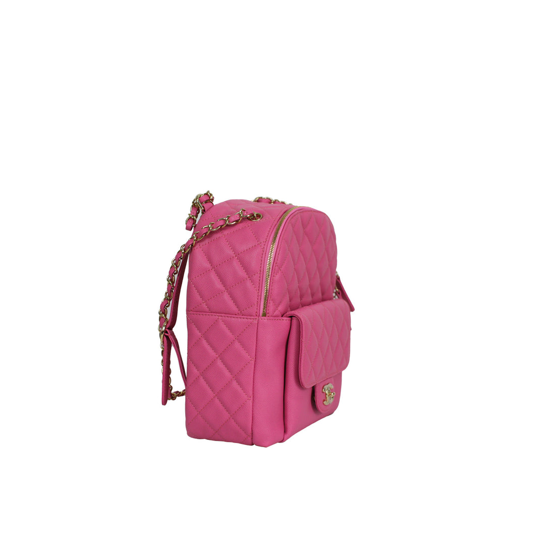 This Chanel backpack features a front flap slip pocket, and a zip closure main compartment.