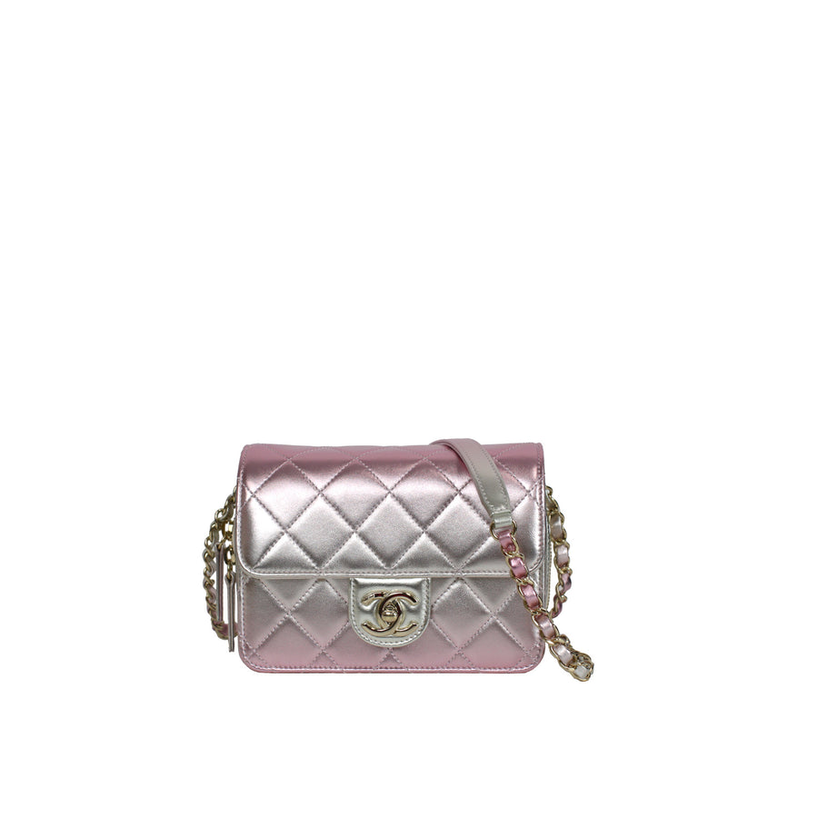 Chanel Like A Wallet Flap bag in iridescent pink and silver gradient colour.