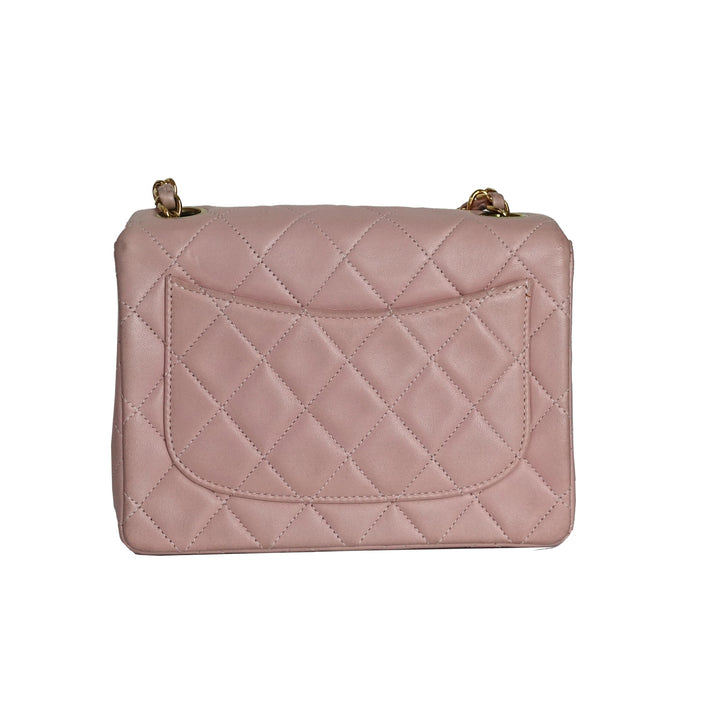 This vintage Chanel bag features a back slip pocket for your essentials.