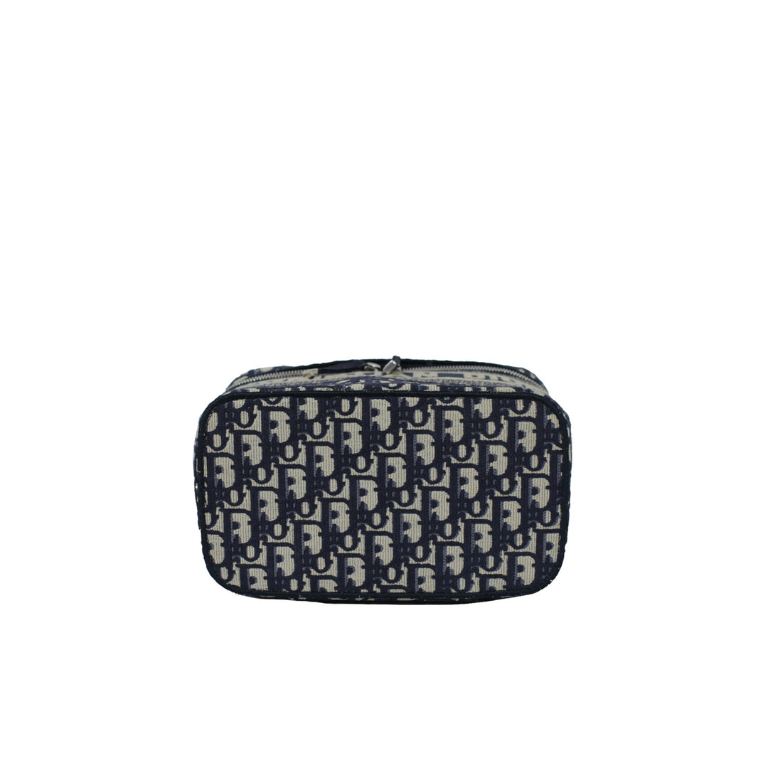 The bottom of the vanity case, with the Dior oblique print.