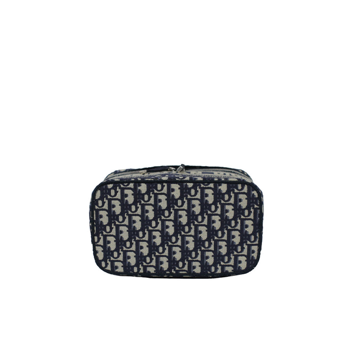 The bottom of the vanity case, with the Dior oblique print.