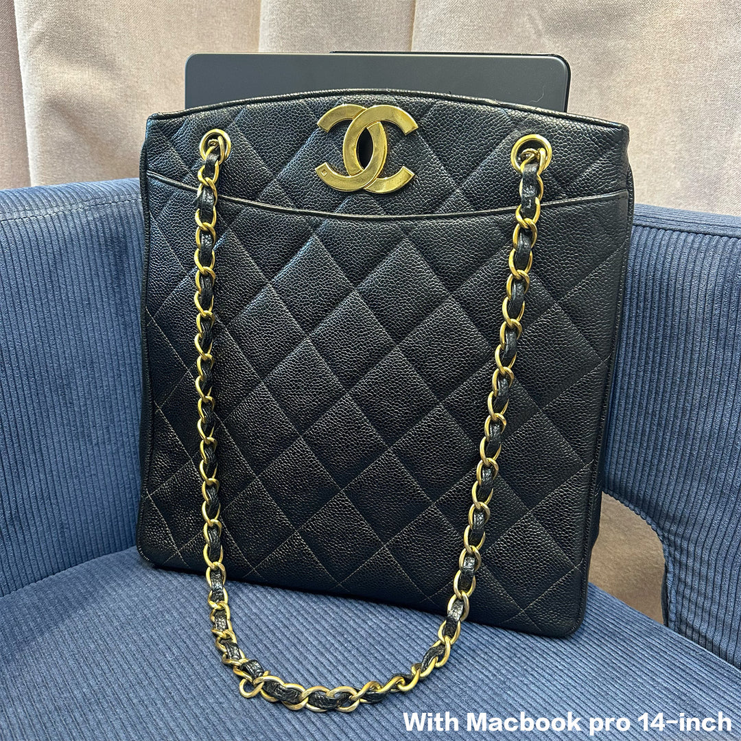 A MacBook Pro 14-inch could fit in the shoulder tote.