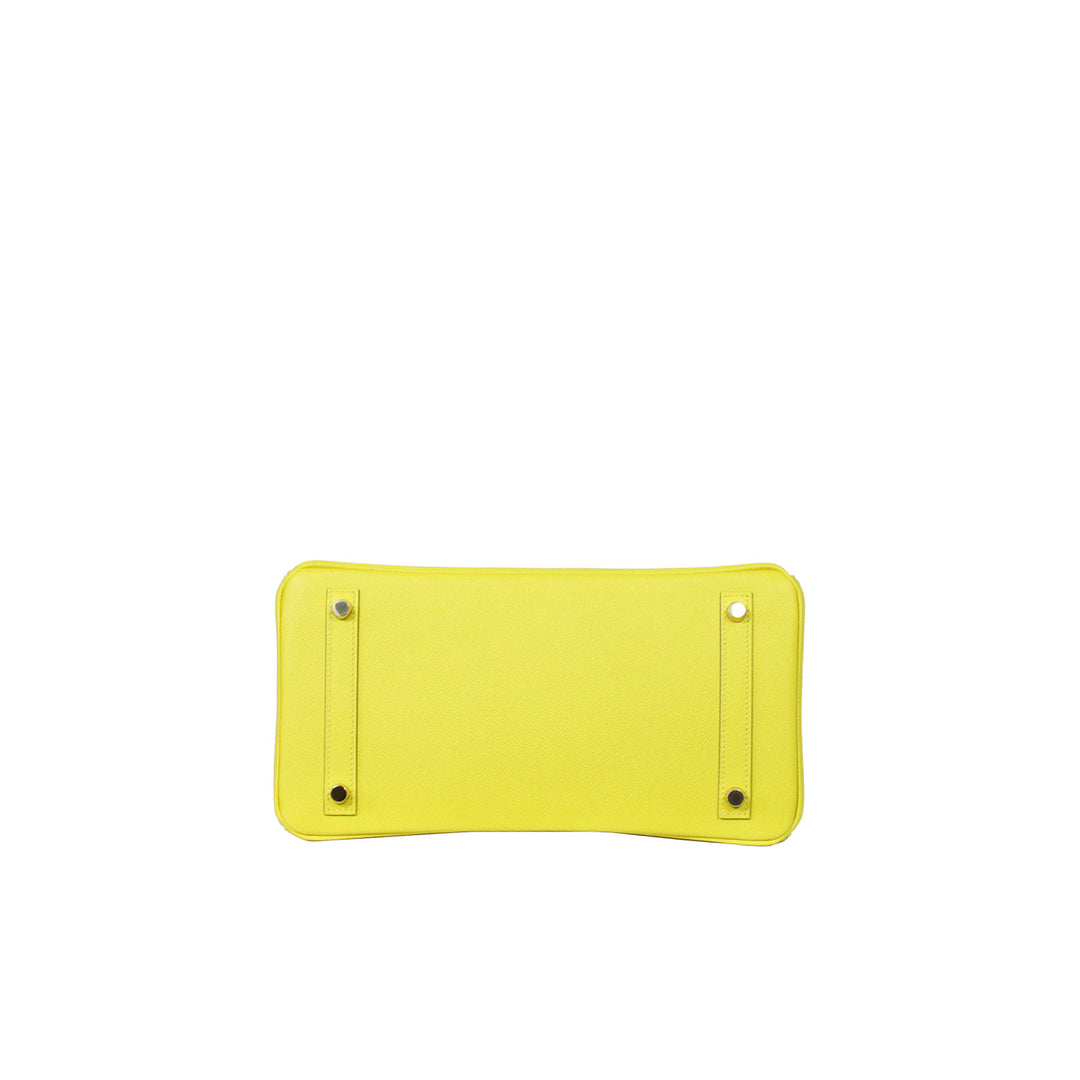 The bottom of the handbag with 4 protective feet hardware.