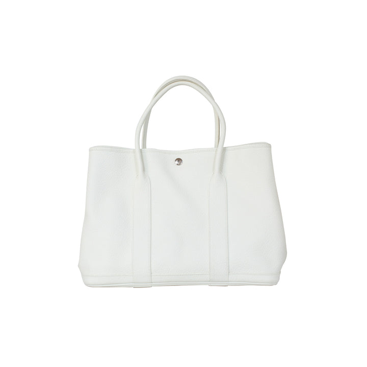 Hermès Garden Party 36 PM in white with silver-toned hardware.