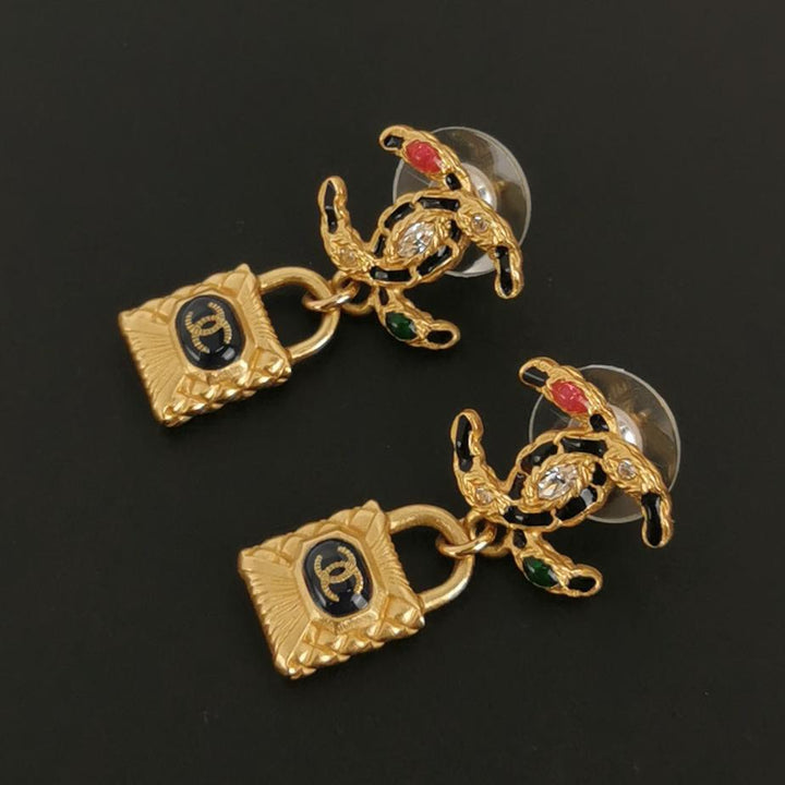 Chanel Goldtone Metal Crystal And Resin Padlock CC Drop Earrings
