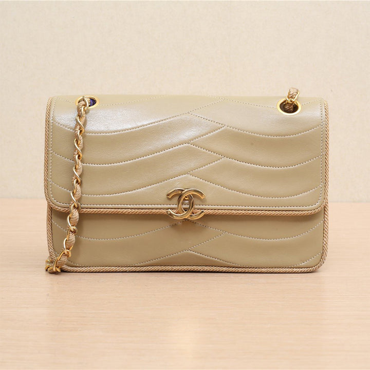 Chanel Vintage CC Small Wave Single Lambskin Flap Beige