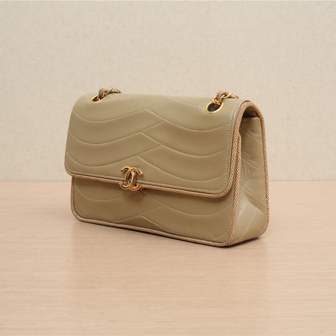 Chanel Vintage CC Small Wave Single Lambskin Flap Beige