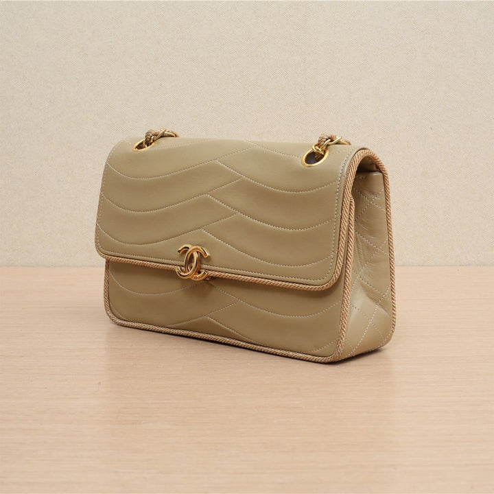 Chanel Vintage CC Small Wave Single Lambskin Flap Beige