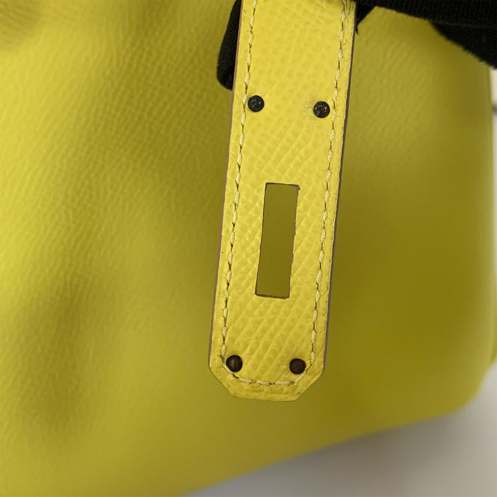 The back of the belt buckle strap.