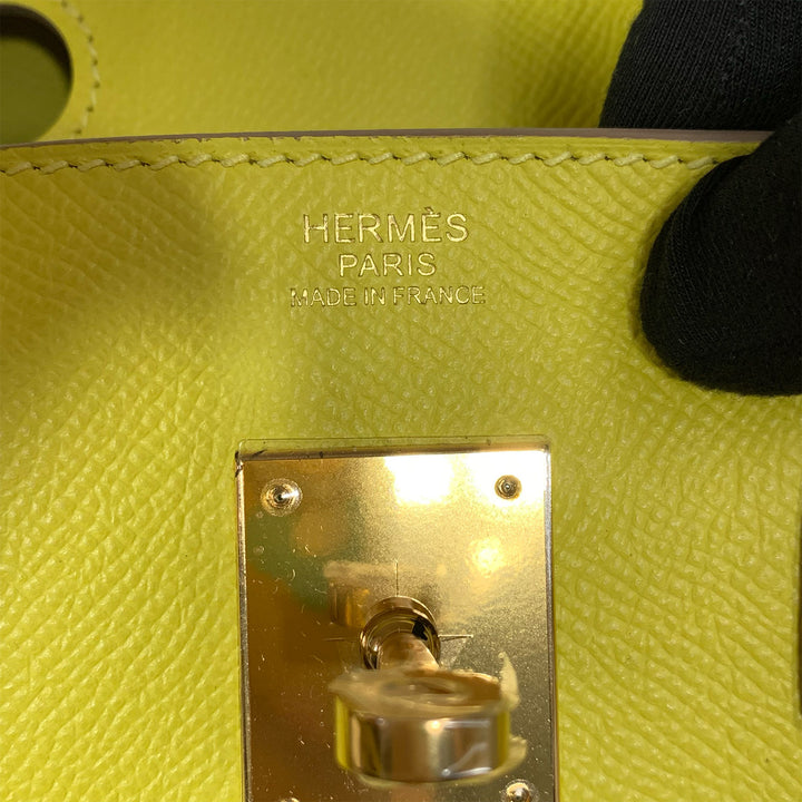 The HERMES PARIS hotstamp on the handbag and this bag was made in France.