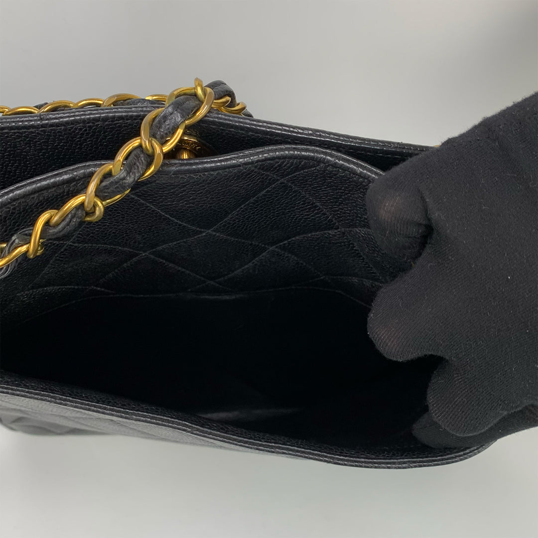 The interior of the back slip pocket, the lining is in black.