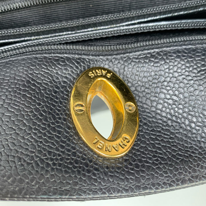 The CHANEL and PARIS engraving on the hardware.