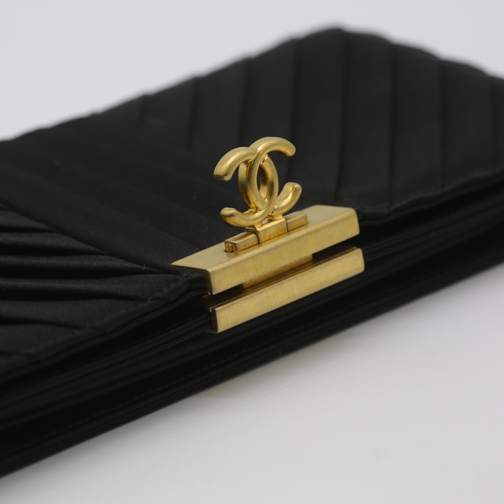Chanel CC Logo Fold Clasp Clutch in Satin Chevron with Gold Hardware