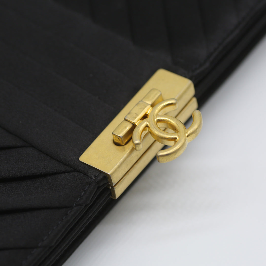Chanel CC Logo Fold Clasp Clutch in Satin Chevron with Gold Hardware