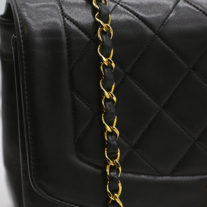 A close-up of the chain strap with 24k gold-plated hardware.