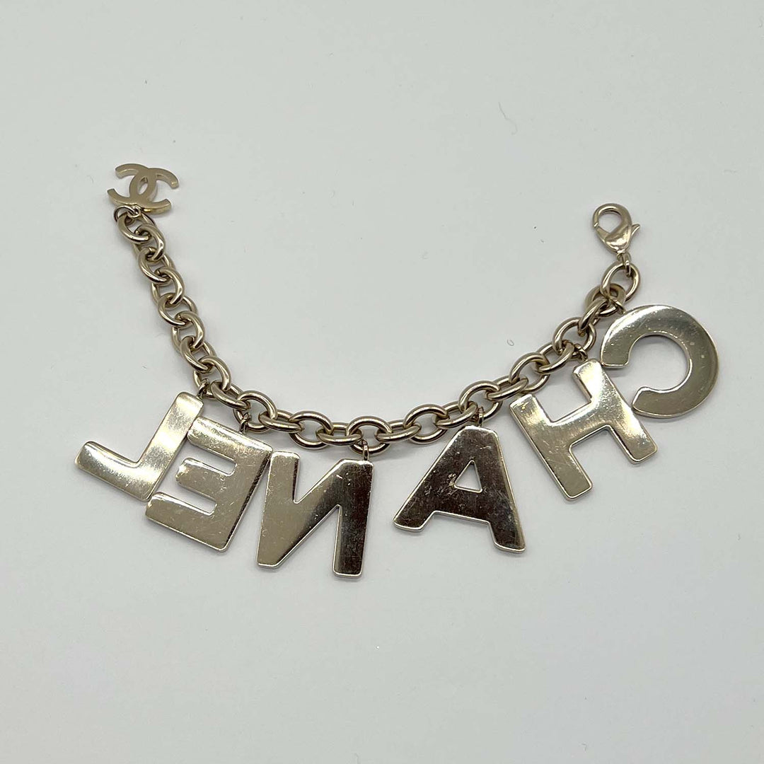 Chanel Black Crystal-Encrusted Letters Gold Chain Charm Bracelet