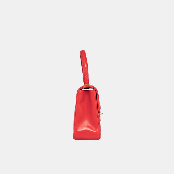 The left side of the bag.
