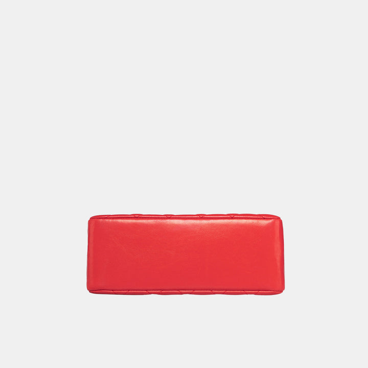The bottom of the bag with smooth leather surface.