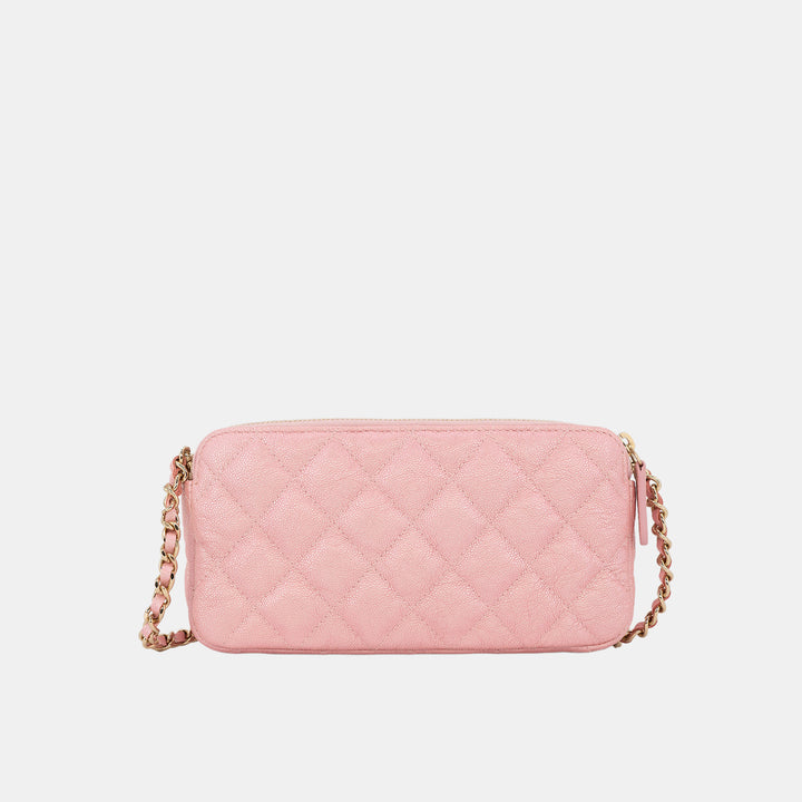 This wallet on chain features the iconic Chanel quilted stitching in pink caviar leather.