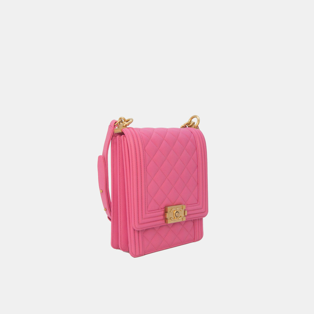 This handbag features a Chanel logo push lock in gold-toned hardware.