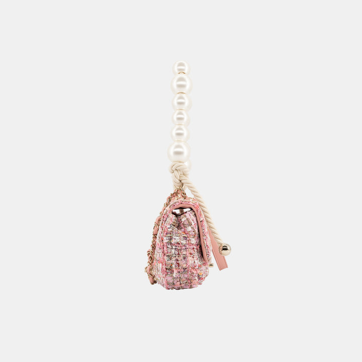 Side of the Chanel Pink Tweed and Pearls Classic Single Flap Bag.
