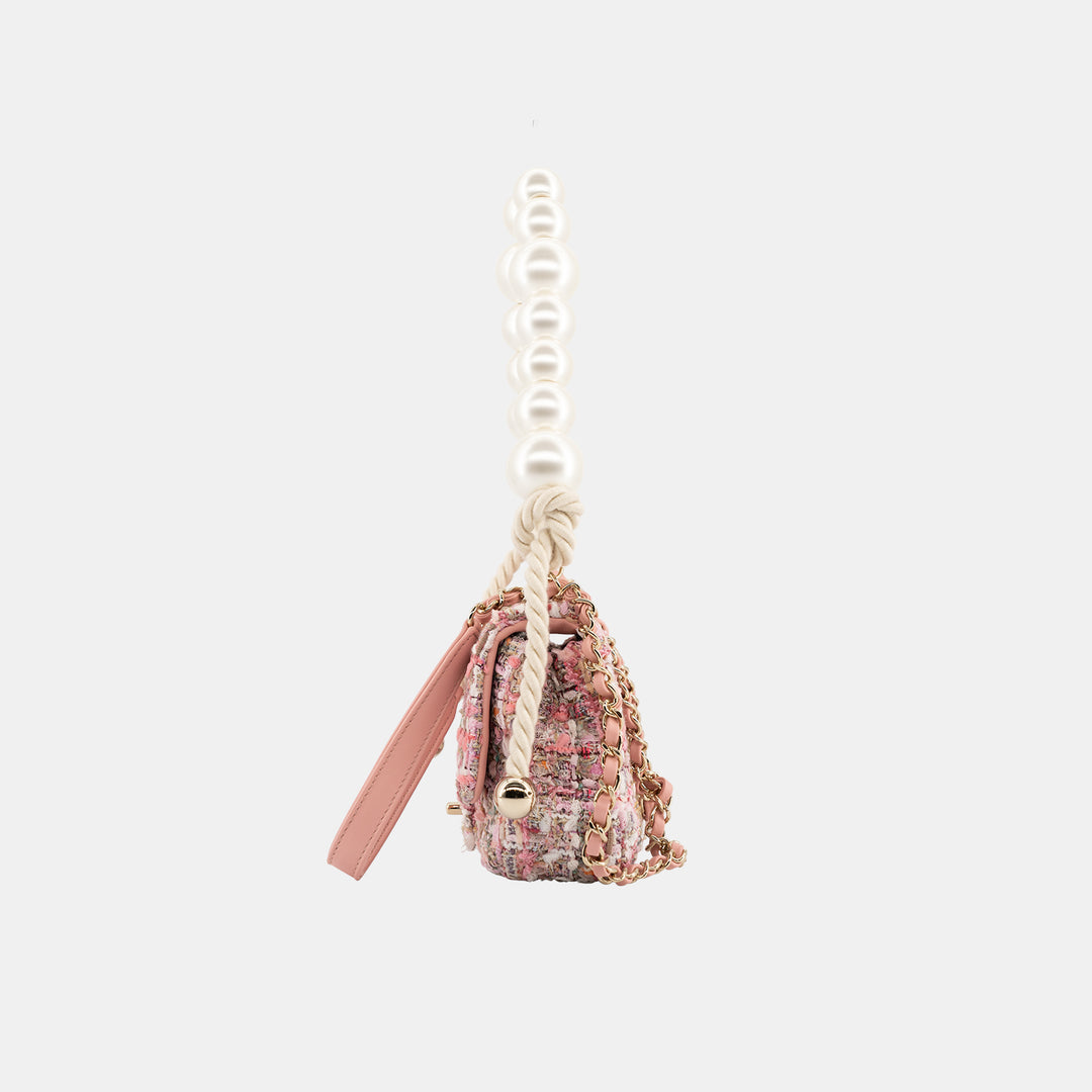 Side of the Chanel Pink Tweed and Pearls Classic Single Flap Bag.
