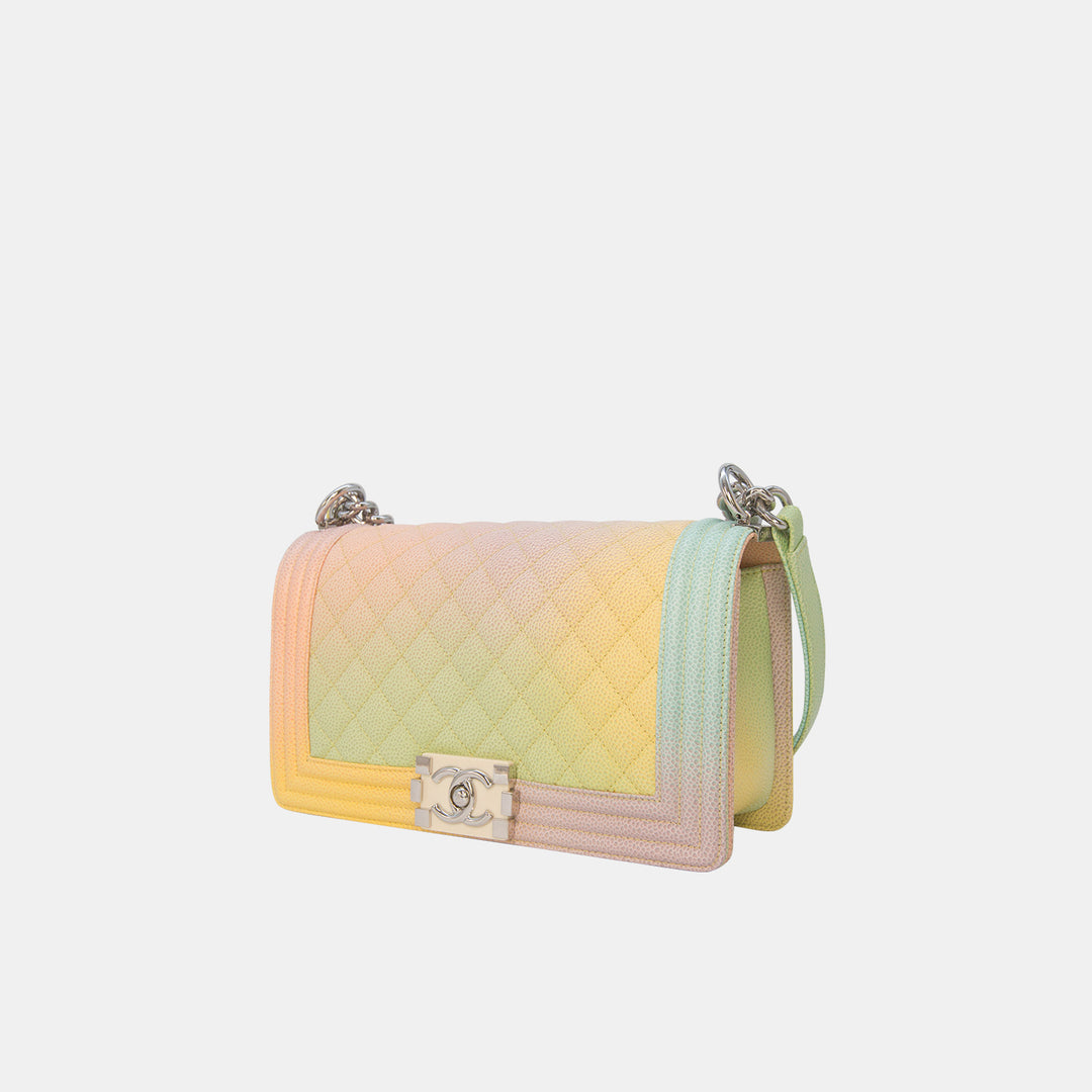 This Chanel Boy bag features a CC logo push lock closure.