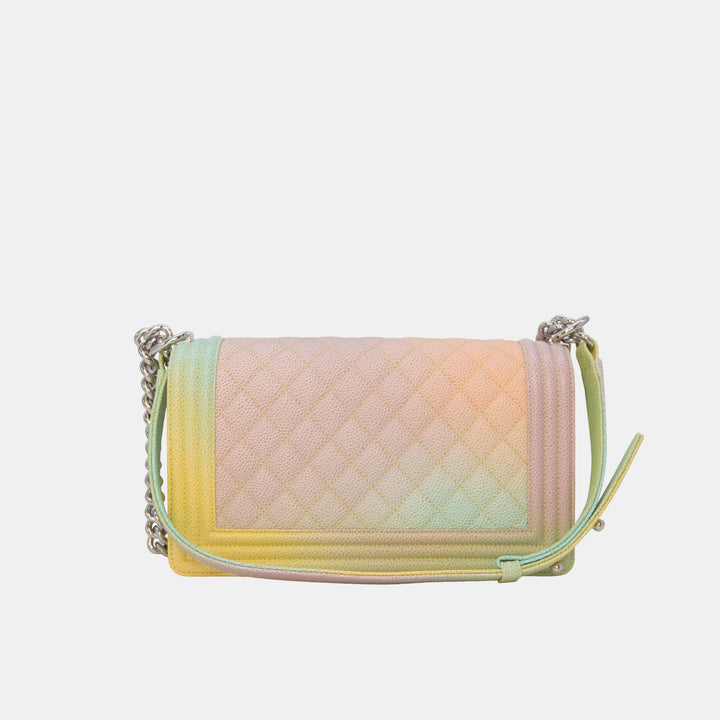 This Chanel Boy bag features the iconic quilted leather stitching and the brand's signature Boy bag design.