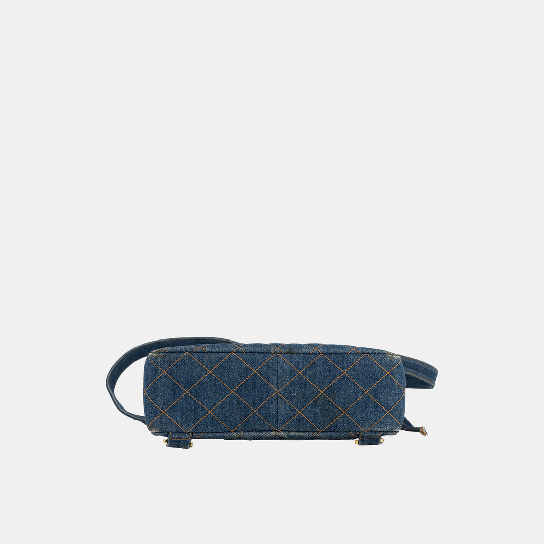 The bottom of the Chanel Vintage Denim Flap Backpack.