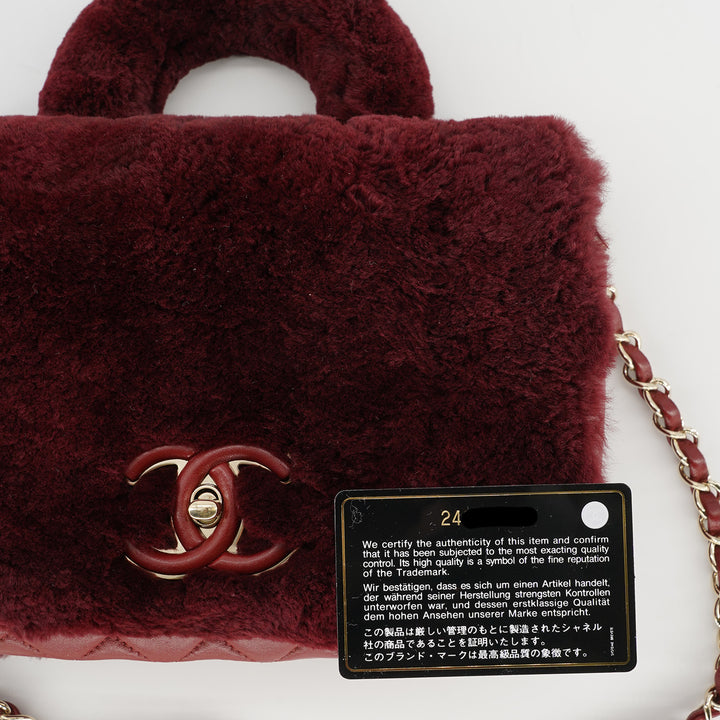 Chanel Metiers D'Art Top Handle Flap Bag in Burgundy Lambskin and Rabbit Fur with Gold Hardware