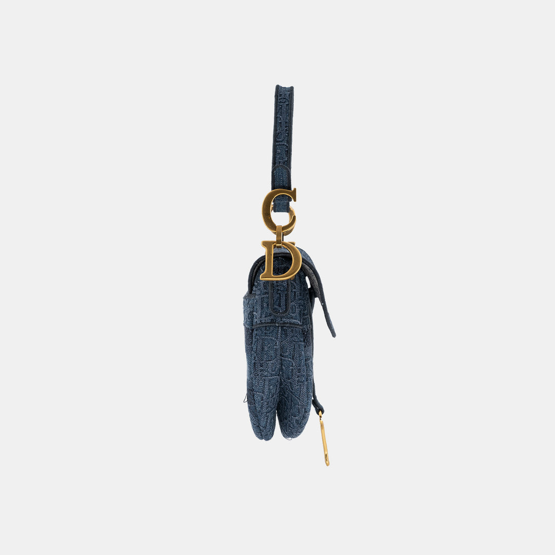 The bag features a CD hardware connecting between the handbag and the shoulder strap.