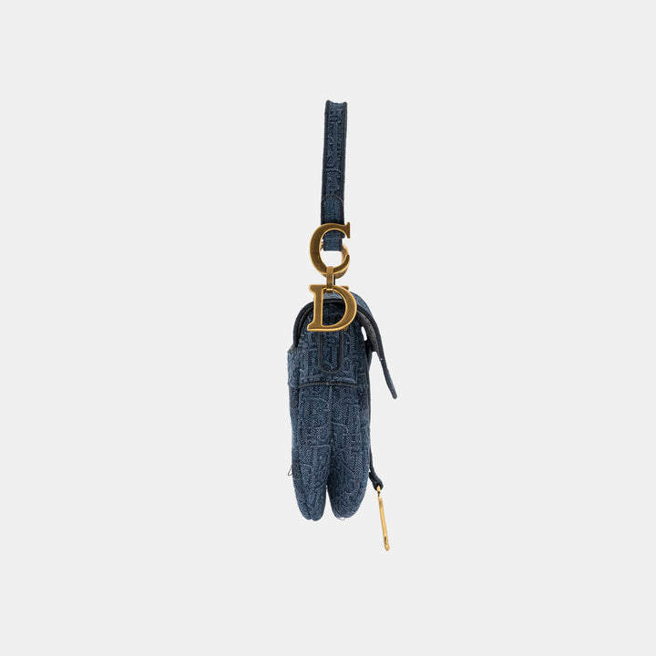 The bag features a CD hardware connecting between the handbag and the shoulder strap.