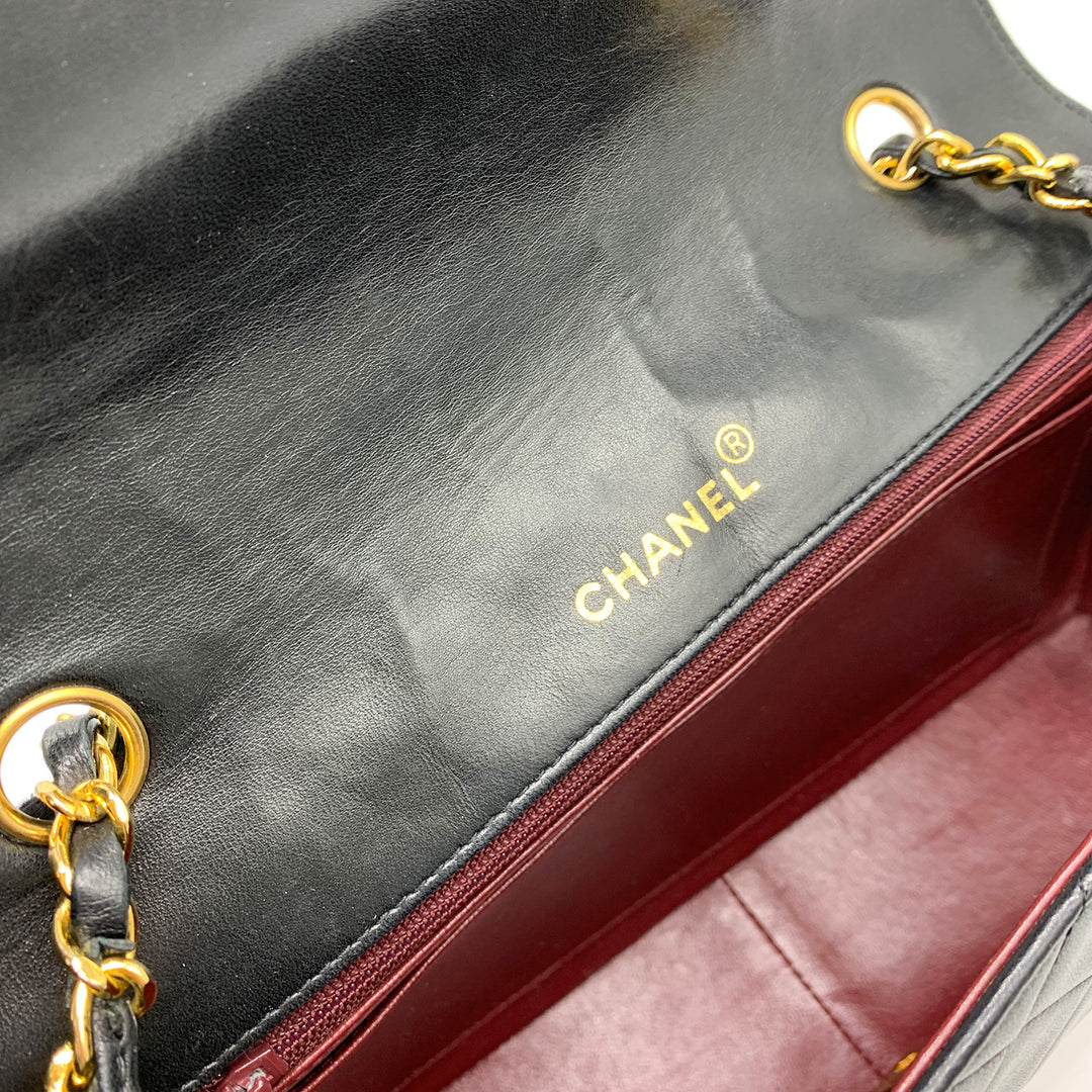 The CHANEL hotstamp logo located on the flap.