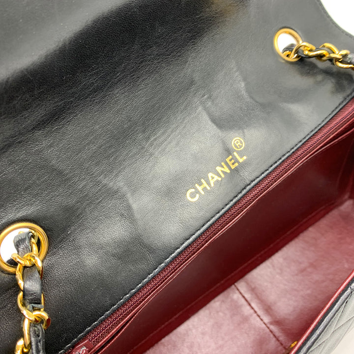 The CHANEL hotstamp logo located on the flap.