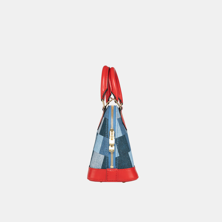 This bag features a zipper closure with Louis Vuitton logo zip pull tags.