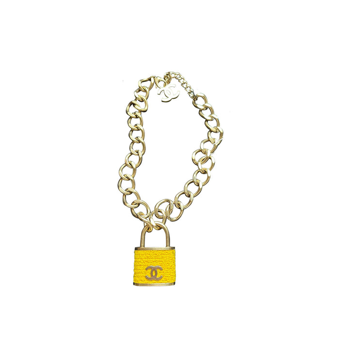 Chanel Goldtone Metal And Yellow Tweed Oversized Padlock CC Necklace
