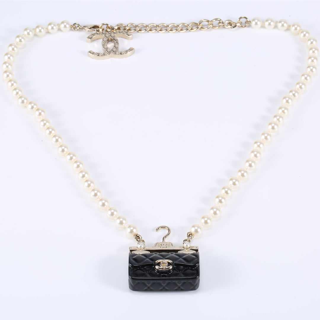 Chanel Pearl Metal Resin Quilted Flap Bag Necklace Gold Black Pearly White