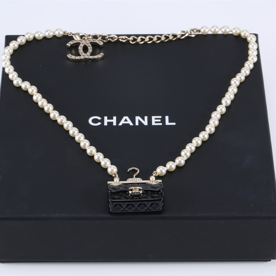 Chanel Pearl Metal Resin Quilted Flap Bag Necklace Gold Black Pearly White