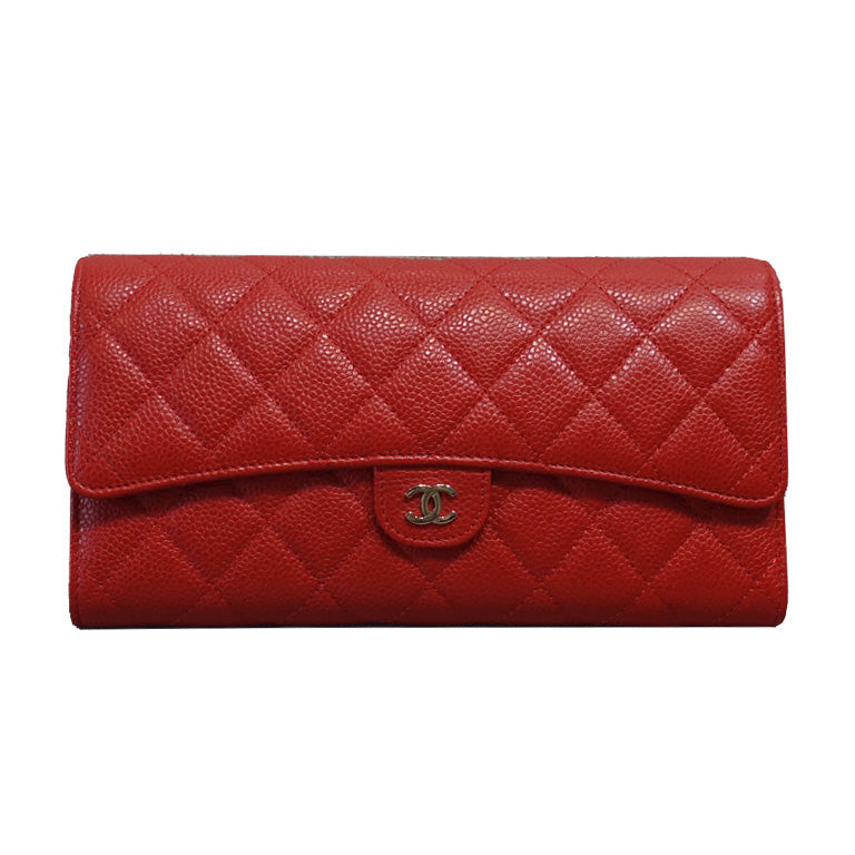 Authentic preloved Chanel Quilted Travel Wallet in red caviar leather and silver-tone CC logo hardware.