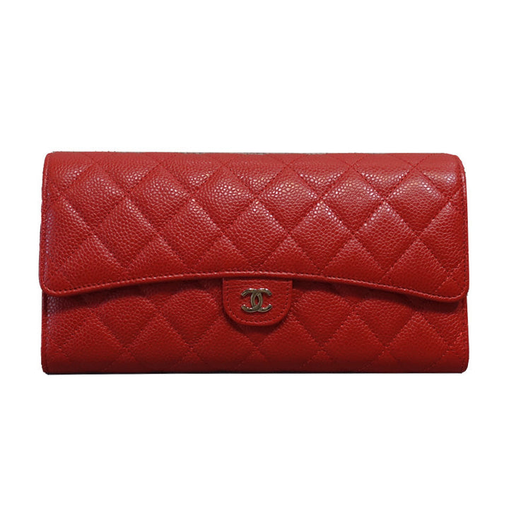 Authentic preloved Chanel Quilted Travel Wallet in red caviar leather and silver-tone CC logo hardware.