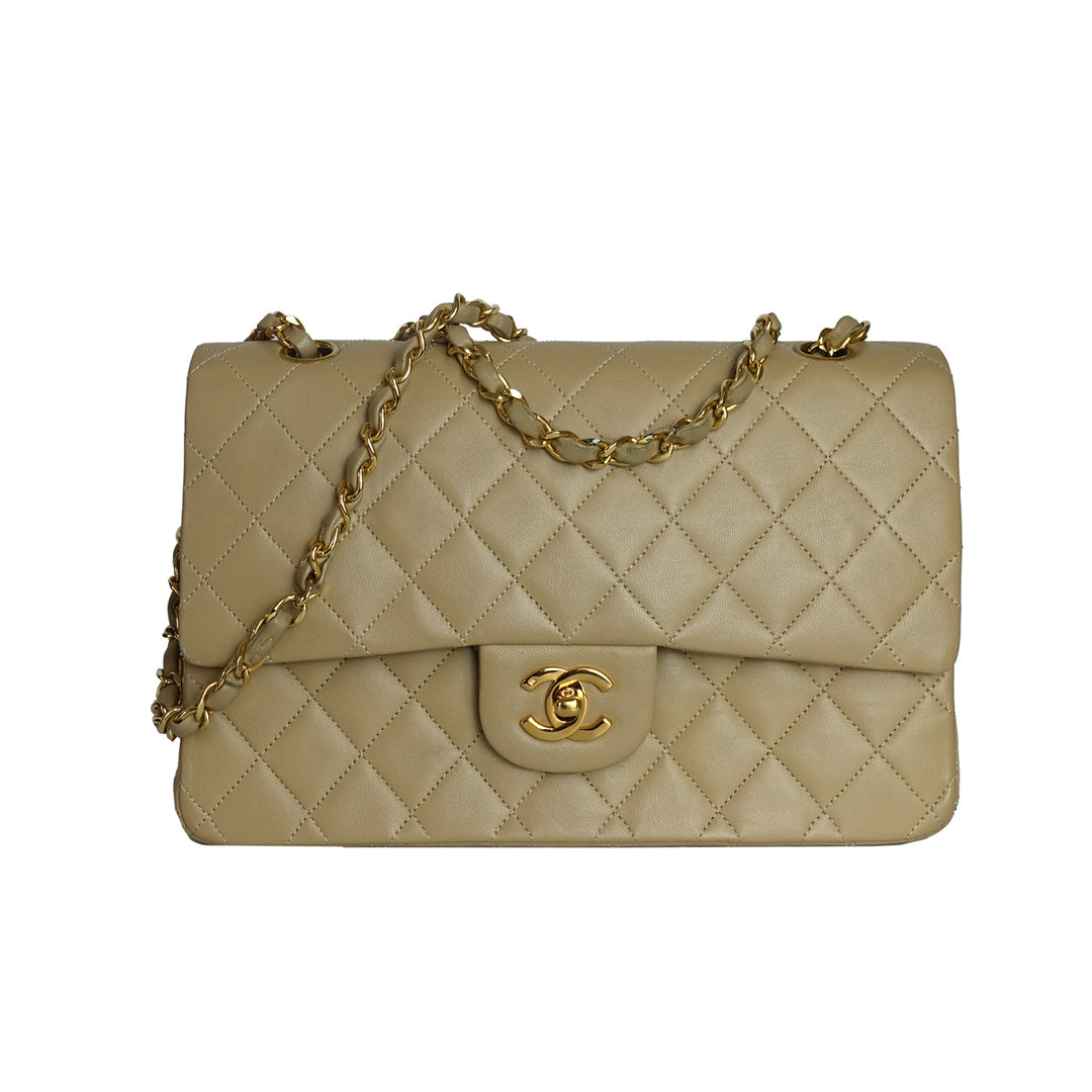Chanel vintage medium Classic Double Flap bag in beige lambskin leather. 