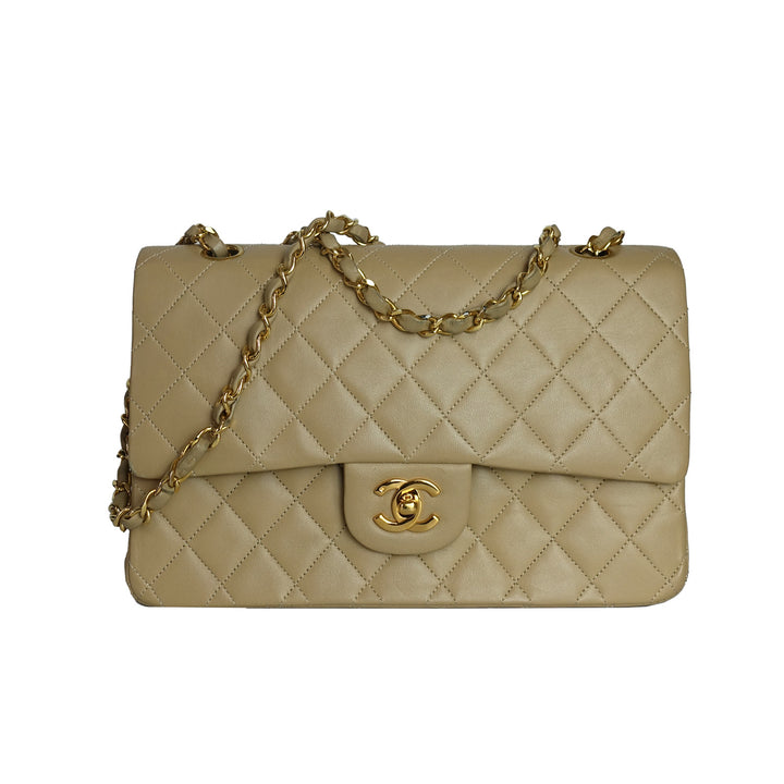 Chanel vintage medium Classic Double Flap bag in beige lambskin leather. 